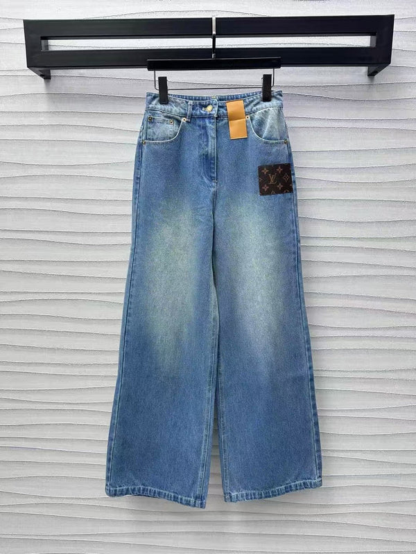 Leather brand denim trousers