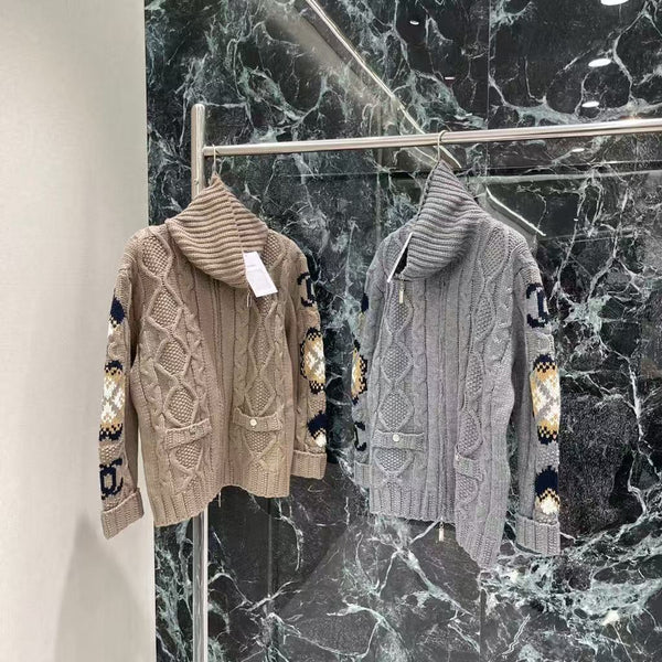 New for Early Fall 2025, this knitted jacquard zipper sweater