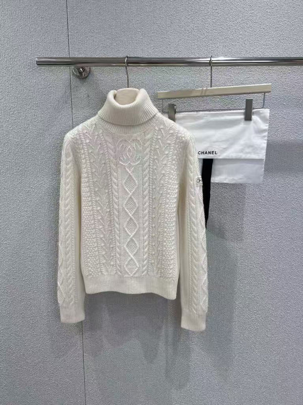 White cable knit turtleneck sweater
